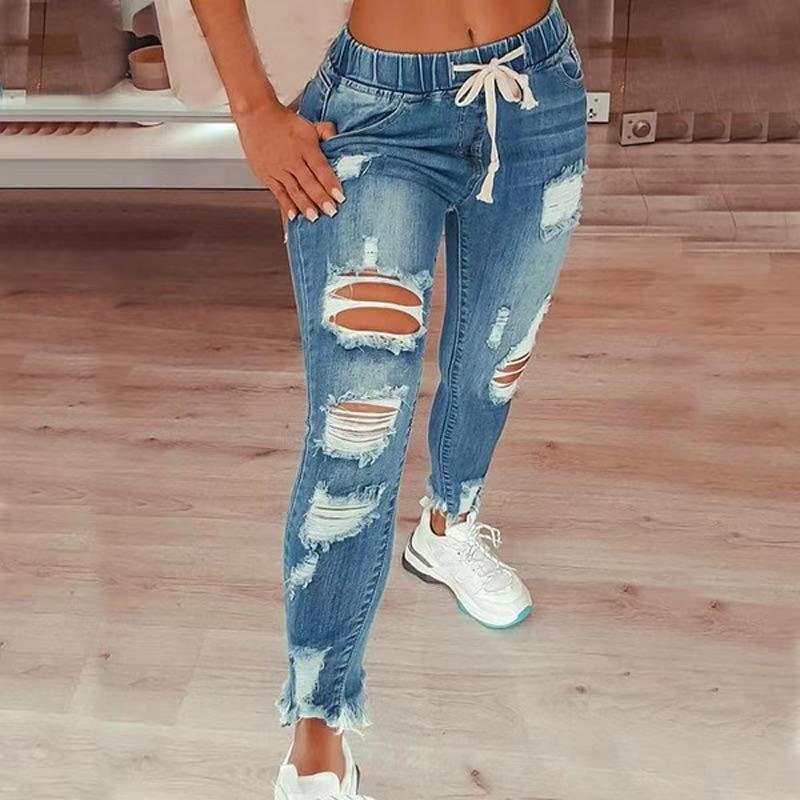 Jean taille haute déchiré à cordon élastique pour femme