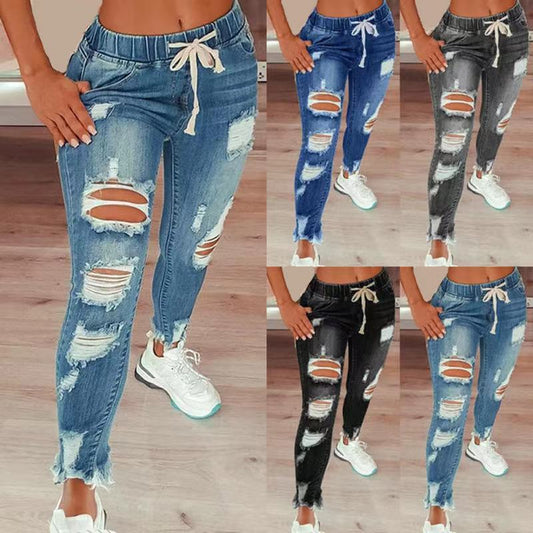Jean taille haute déchiré à cordon élastique pour femme