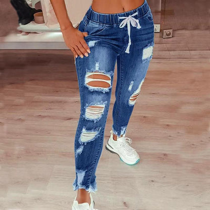 Jean taille haute déchiré à cordon élastique pour femme