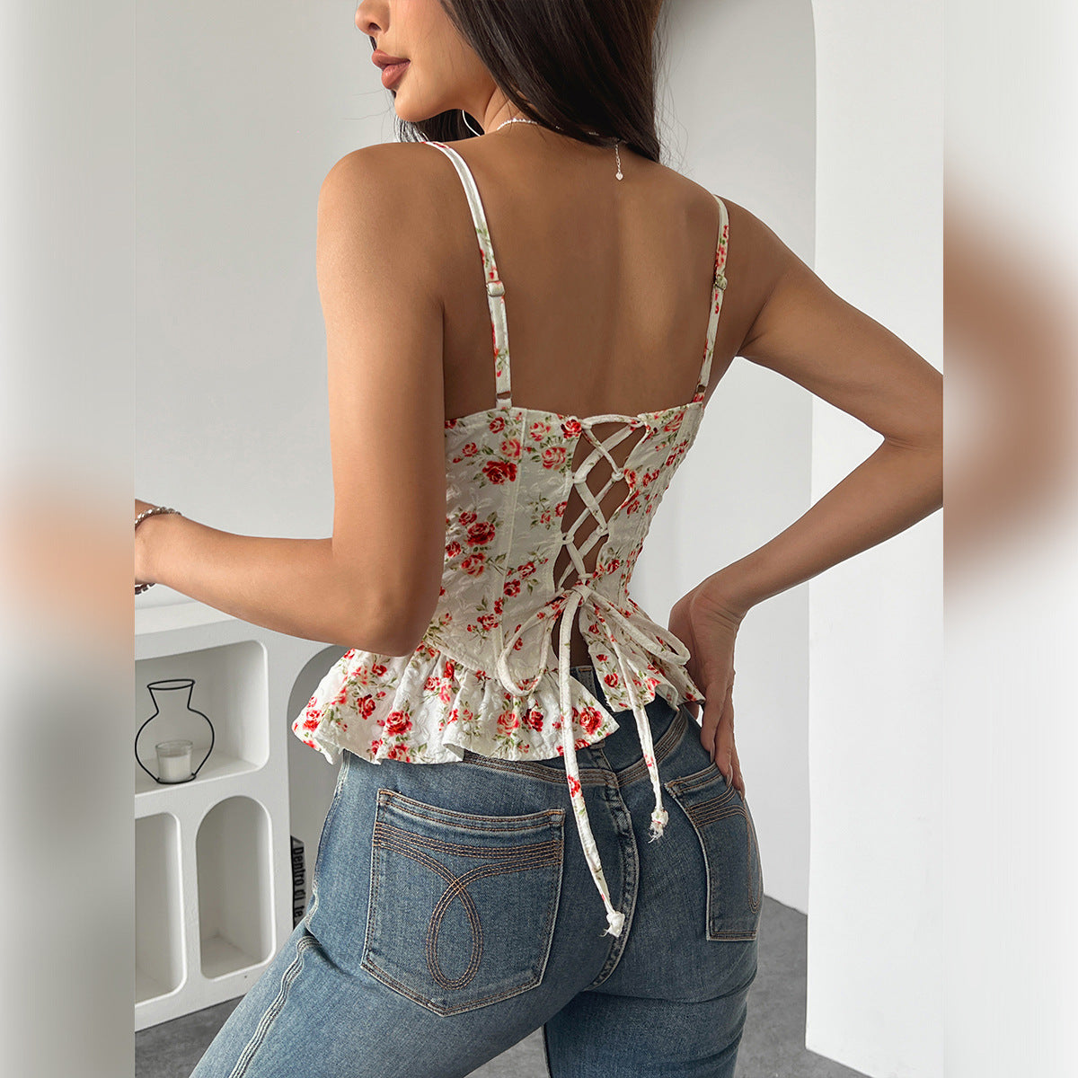 Haut asymétrique à volants imprimé floral